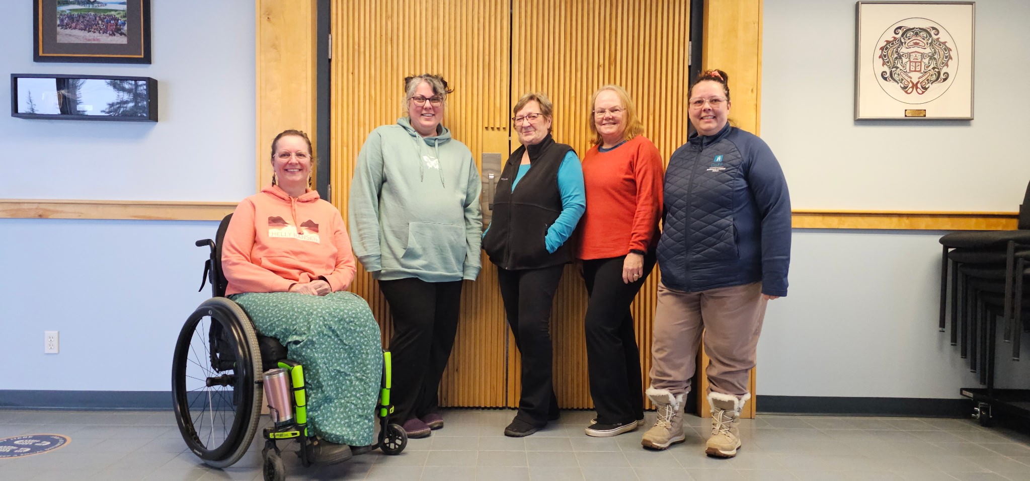 The AIA Committee poses for a photo with Council Liaison Raye McMeeken