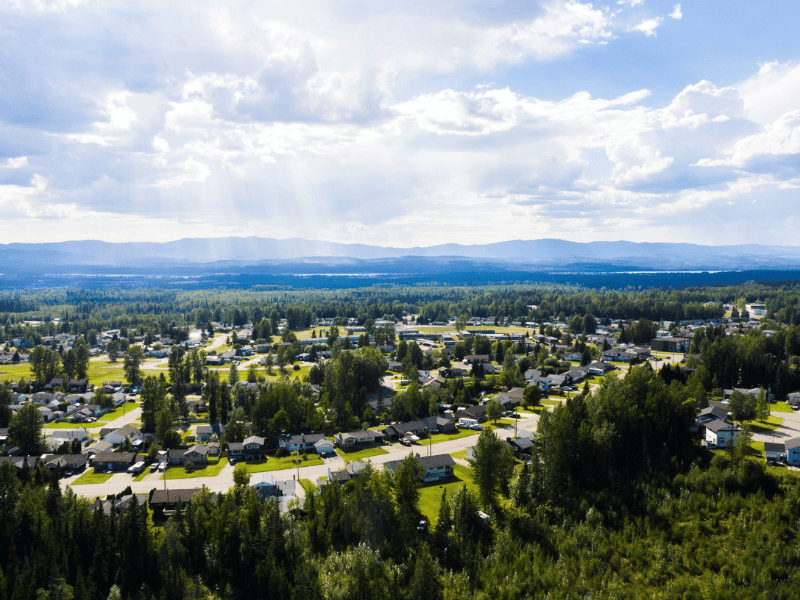 Hosuing Needs Report photo Aerial view of Mackenzie, BC, looking east towards the Omenica Range.